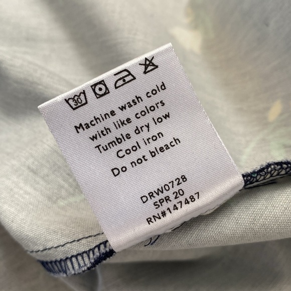 Draper James navy floral sleeveless dress with ruffled hem. - Picture 5 of 12